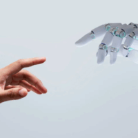 Human hand reaching toward a robotic hand, symbolizing change management in robotics