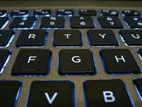 how to implement ai into java, pictured as a backlit laptop keyboard