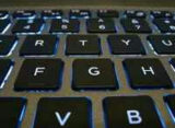 Backlit laptop keyboard, illustrating how to make an AI chatbot in Java