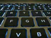 Backlit laptop keyboard, illustrating transformer models explained